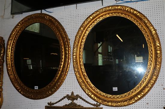 Pair of oval gilt frame wall mirrors(-)